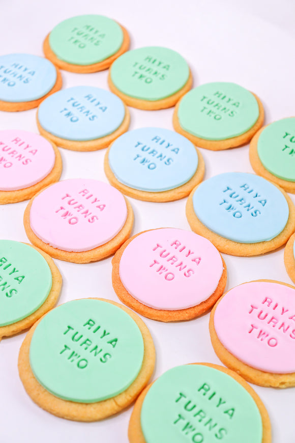 Fondant sugar cookies with personalised writing